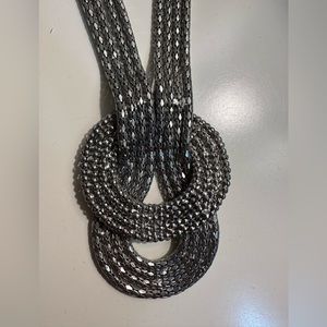 Metal necklace.